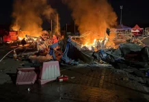 Масована атака на Київ і передмістя: що відомо станом на ніч Пожежа на ринку «Столичний» після російського удару