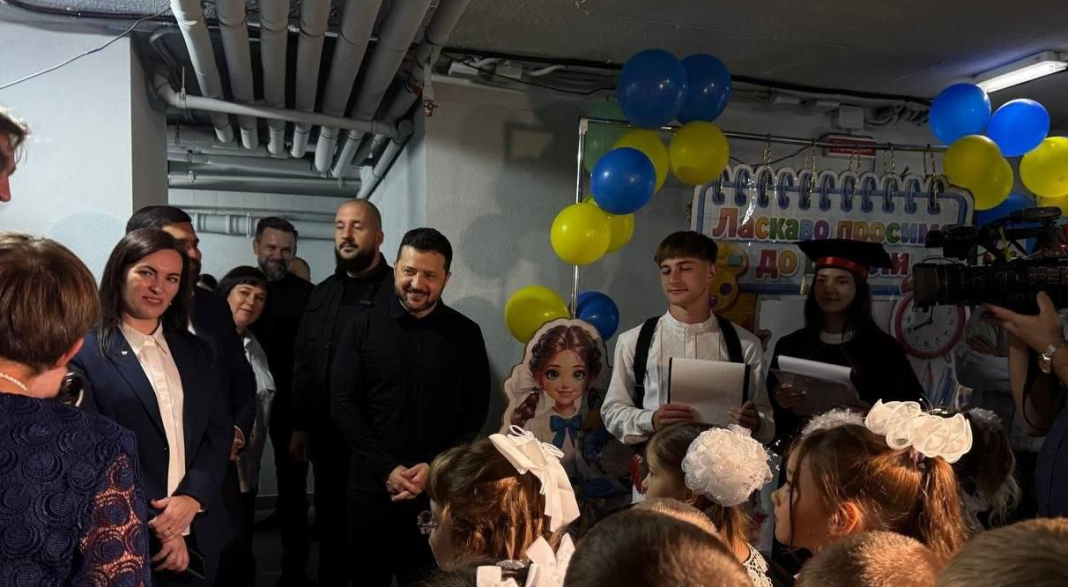 Volodymyr Zelenskyy is talking to the pupils Volodymyr Zelenskyy speaks to pupils at a secondary school in the Kyiv region