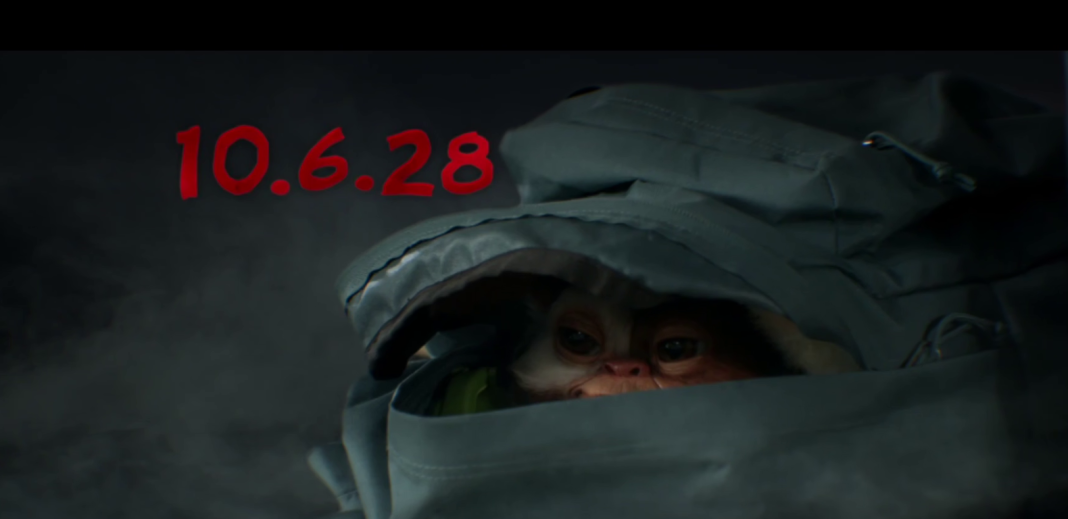 Gizmo peeks out of a rucksack in the teaser trailer for *Gremlins 3*«