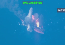 The US and Iran exchanged strikes on ships near the Strait of Hormuz A ship at sea against the backdrop of tensions in the Strait of Hormuz