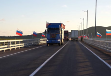 Lorries are travelling across the new road bridge between Russia and North Korea