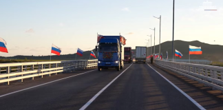 Lorries are travelling across the new road bridge between Russia and North Korea