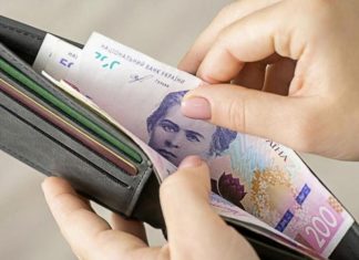 An employee is checking her payslip