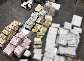 Cash seized by law enforcement officers during searches of a financial network