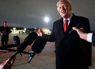 US President Donald Trump speaks to journalists