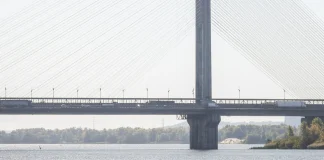 The Southern Cable-Stayed Bridge in Kyiv over the Dnipro, with motor vehicles on the carriageway