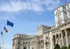 У Румунії після шести місяців кризи затвердили новий уряд Будівля Палацу парламенту Румунії в Бухаресті з прапорами Румунії та Європейського Союзу перед головним фасадом.