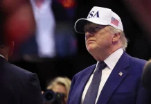 69% виборців США стурбовані ризиками в адміністрації Трампа Дональд Трамп в кепці USA