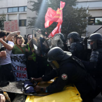 Protests in France have turned violent: a secondary school headteacher was doused with petrol