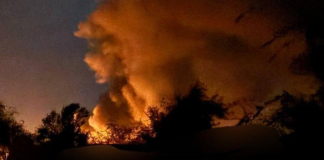 A key factory belonging to the Russian defence industry has been attacked in the Tver Region Thick smoke over an industrial area at night.