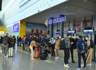 A Ukrainian woman has been detained in Kazakhstan following a request for her extradition from Russia Passengers with luggage in the check-in area at Astana International Airport