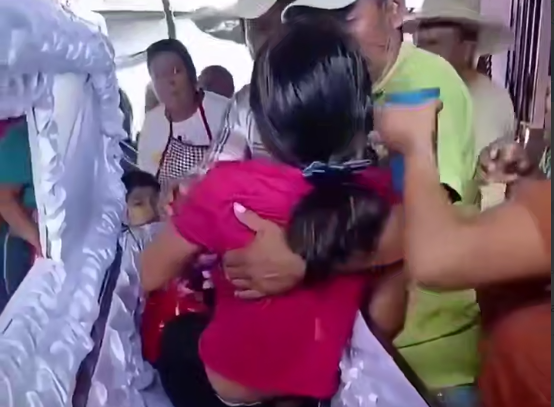 The girl in the coffin In Guatemala, a 15-year-old girl is helped out of her coffin after unexpectedly waking up during her funeral