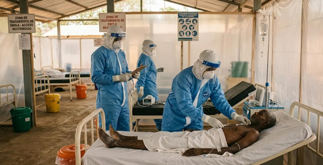 Healthcare workers in protective suits during operations to combat the spread of the Ebola virus in Africa.