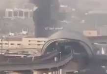 Thick black smoke rises above the city’s buildings near the motorway junction in footage being circulated in connection with the attacks on Saudi Arabia.