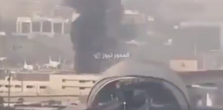 Thick black smoke rises above the city’s buildings near the motorway junction in footage being circulated in connection with the attacks on Saudi Arabia.