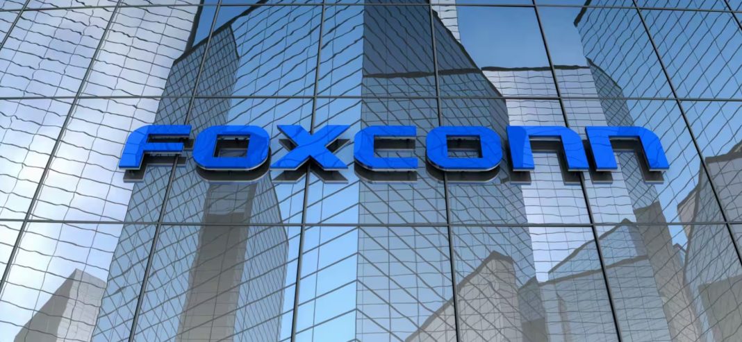 The large blue logo of the Taiwanese technology company Foxconn