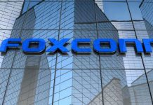 OpenAI and Foxconn are preparing a new deal amid the AI boom The large blue logo of the Taiwanese technology company Foxconn