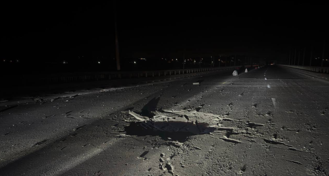 The bridge in Zaporizhzhia A large crater on the bridge over the Dnieper in Zaporizhzhia following a Russian strike