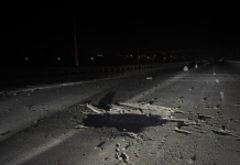 A large crater on the bridge over the Dnieper in Zaporizhzhia following a Russian strike