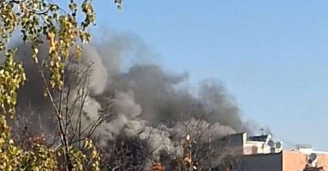 Thick smoke rising above residential buildings during the Russian drone attack on Kharkiv on 12 October 2026