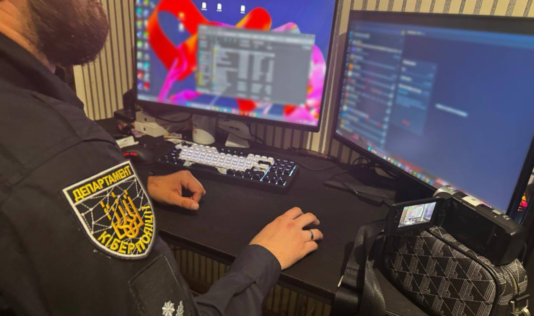 d Cnhb Call Centre. A Cyber Police officer examines computer equipment during the raid on a fraudulent call centre in Stryi, Lviv Oblast