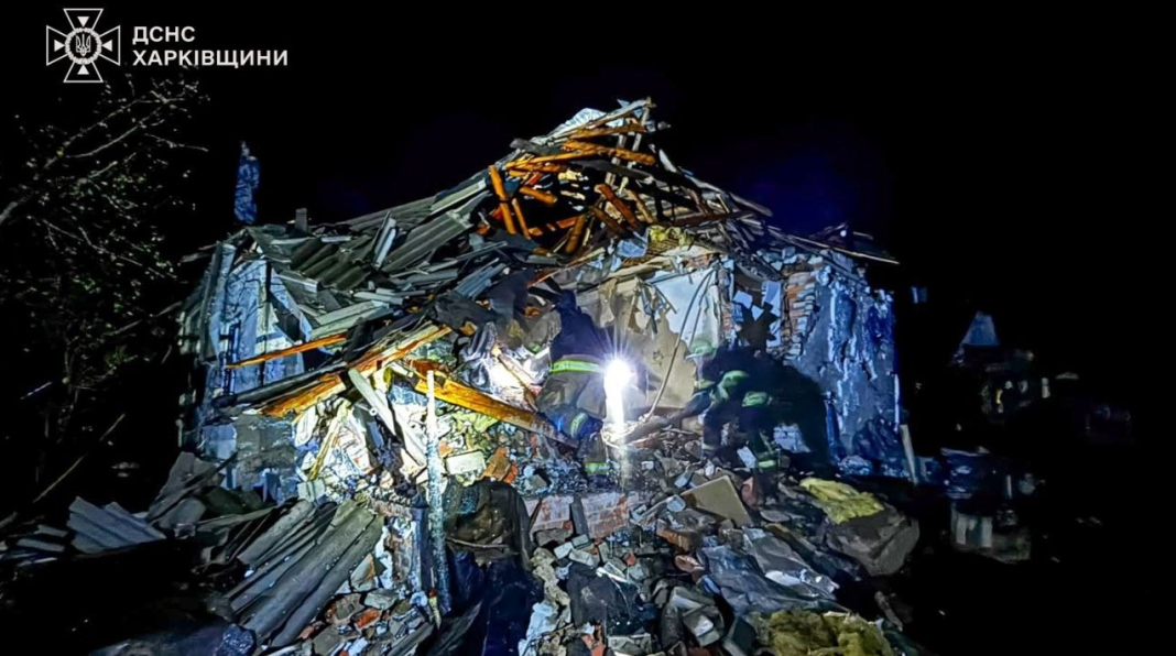 Rescue workers from the State Emergency Service are clearing the rubble of a destroyed private house in Korotych, Kharkiv Oblast, following a Russian drone attack on 21 October 2026.