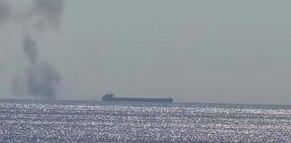 A vessel from Izmail has sunk in the Black Sea: the possibility of a drone strike is being investigated A ship in the Black Sea against a backdrop of smoke following a maritime incident