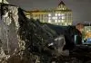 A partially destroyed single-storey brick building in Kyiv following a Russian ballistic attack