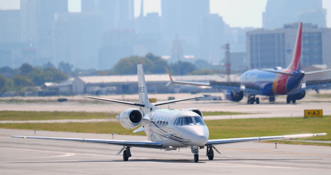 A private business jet on the airport taxiway