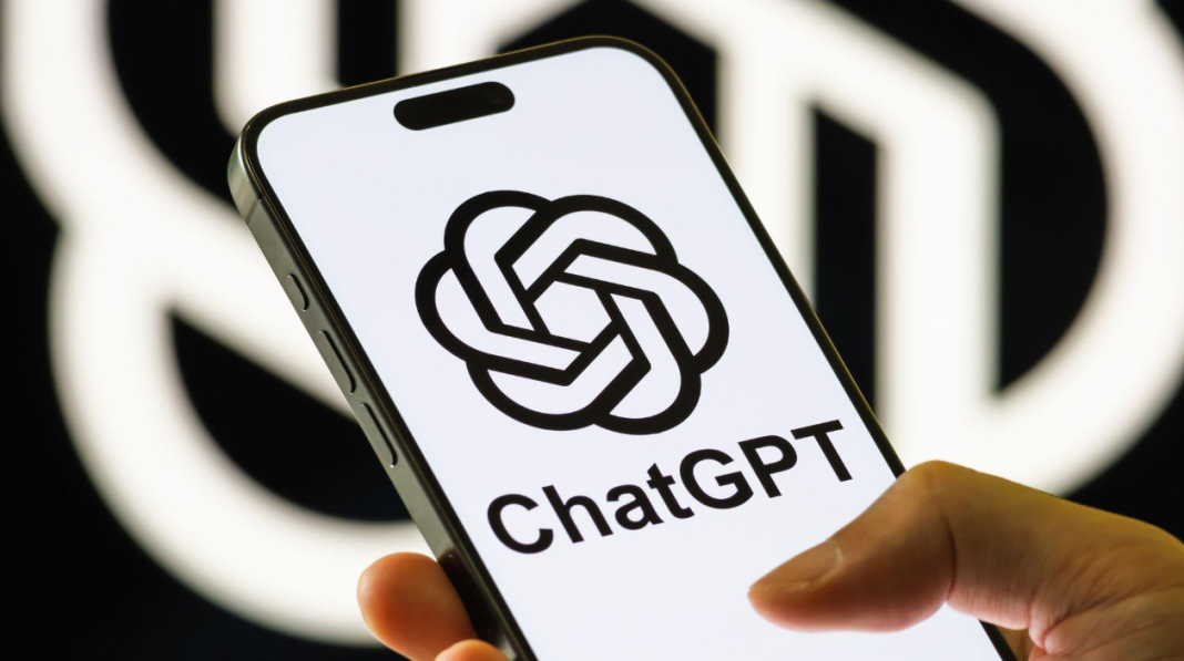 Логотип ChatGPT Логотип ChatGPT на екрані смартфона на тлі символіки OpenAI