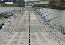 New crossings over the Dnipro are being planned in Kyiv: when will the first bridges be built? A temporary metal footbridge across a body of water with a road deck