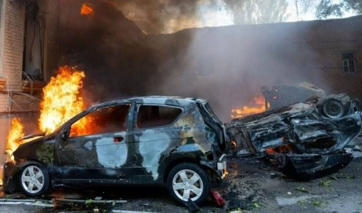 Burning cars following a Russian missile strike