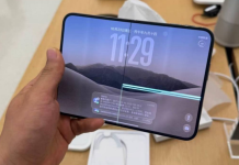 A dismantled iPhone Duo with a vertical crack