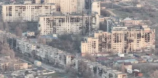 Damaged and partially destroyed residential buildings in Oleshky, Kherson Oblast