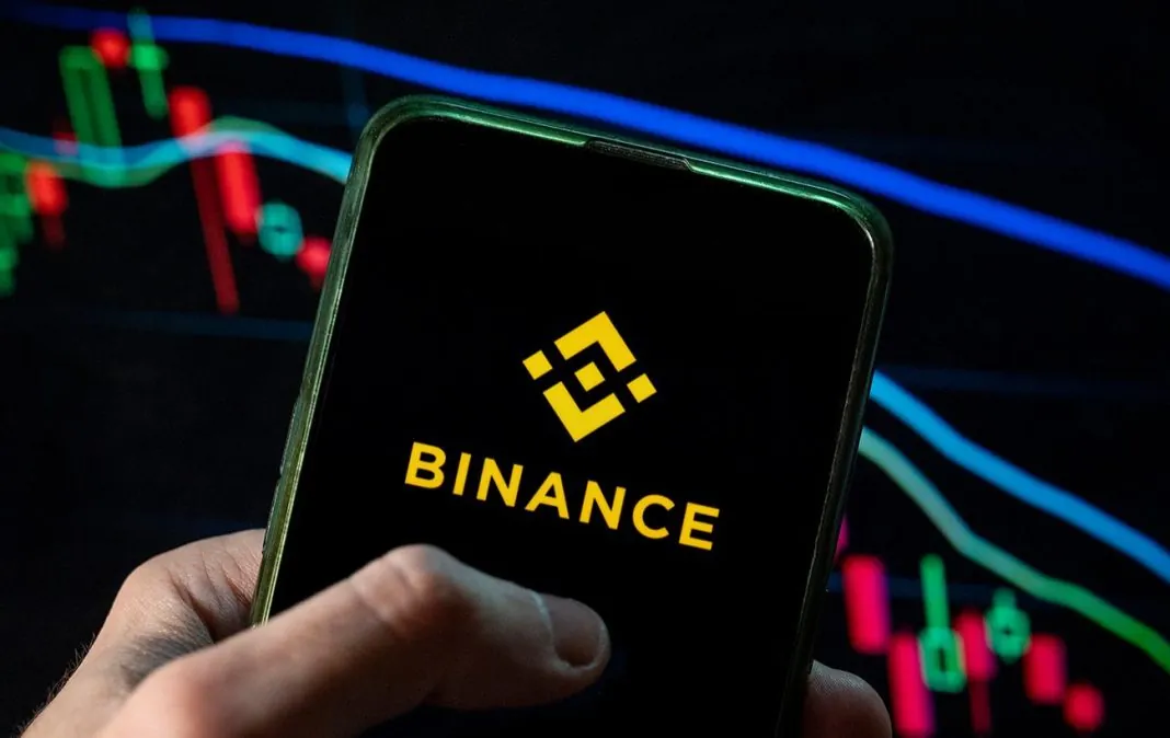 Логотип криптовалютної біржі Binance на екрані смартфона