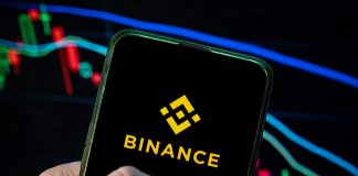 Binance suffered a massive hack amounting to $6.3 billion: the exchange has suspended withdrawals The Binance cryptocurrency exchange logo on a smartphone screen