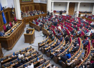 Members of the Ukrainian Parliament during a plenary session of the Verkhovna Rada, where budget matters and changes to state funding are being discussed