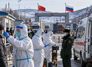 China has responded to the threat of the plague in Russia: what is known Medical staff in protective suits whilst assessing the risk of the plague spreading