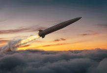 A ballistic missile with a trail of fire