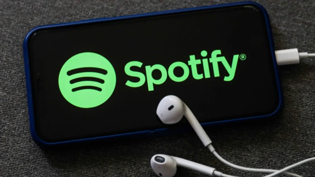 Spotify audiobooks A smartphone featuring the Spotify logo