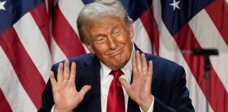 Трамп образив Норвегію після рішення Нобелівського комітету Дональд Трамп у темному костюмі та червоній краватці