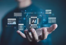 AI-агенти змінюють інтернет: чому 2026 рік може стати переломним для штучного інтелекту Рука тримає віртуальний інтерфейс із написом AI Agents, вікнами даних і командним рядком