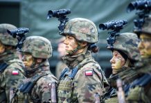 Poland is preparing for a «pre-war» regime: troops will be able to be redeployed under martial law Polish soldiers equipped with night-vision devices whilst forming up