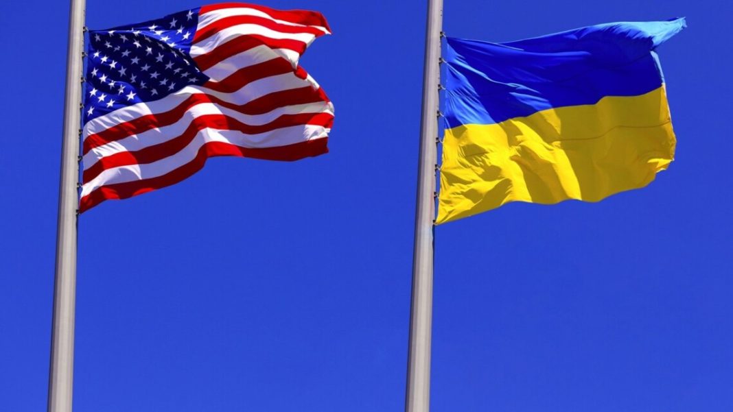 Flags of the USA and Ukraine The flags of the USA and Ukraine are flying from the flagpoles