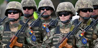 Румунські військові під час підготовки на тлі навчань резервістів MOBEX