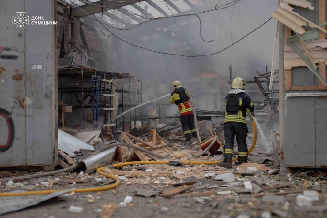 photo_28 October 2026_13:31:29 Rescue workers from the State Emergency Service are extinguishing a fire amongst the ruins of a warehouse in Sumy