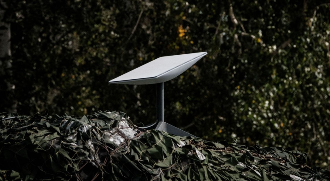 A Starlink satellite terminal at a camouflaged field position used by the Ukrainian military.