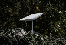 A Starlink satellite terminal at a camouflaged field position used by the Ukrainian military.