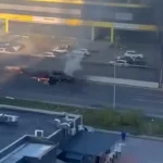 Під Києвом після атаки дрона загорілися автомобілі: що відомо